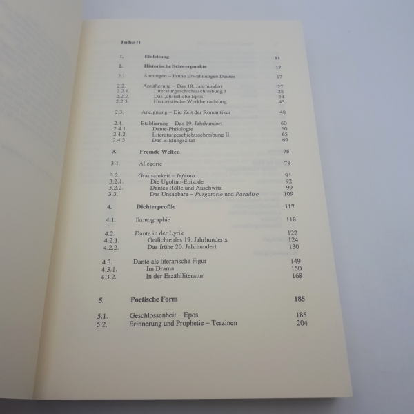 Hölter, Eva: "Der Dichter der Hölle und des Exils" Historische und systematische Profile der deutschsprachigen Dante-Rezeption